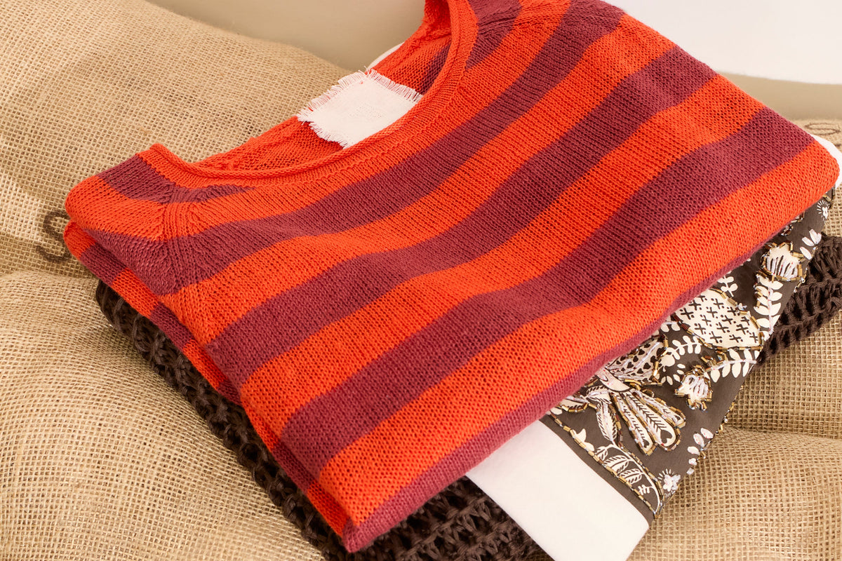 Folded knits & dresses by Oui clothing.