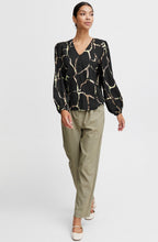 Black and Sharp Green Blouse