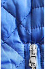 Bright blue quilted jacket