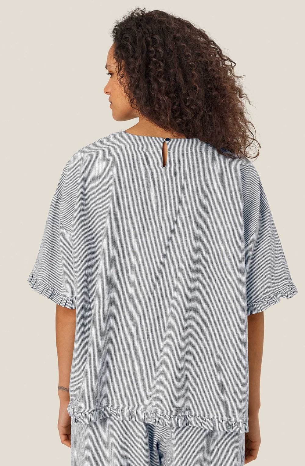 Dreuma Faded Black Stripe Ruffle Top