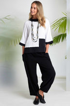 Monochrome Embossed Jacquard and Funnel Neck Top