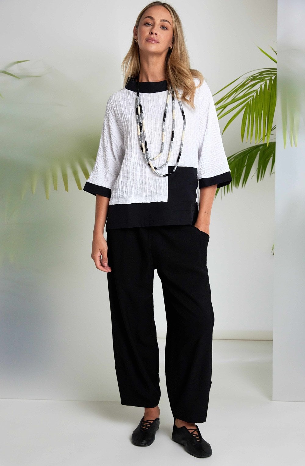 Monochrome Embossed Jacquard and Funnel Neck Top