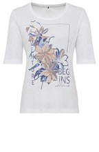 White T Shirt With Blue Floral Design