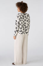 Bold Print Rounded Hemline Jacquard Jumper