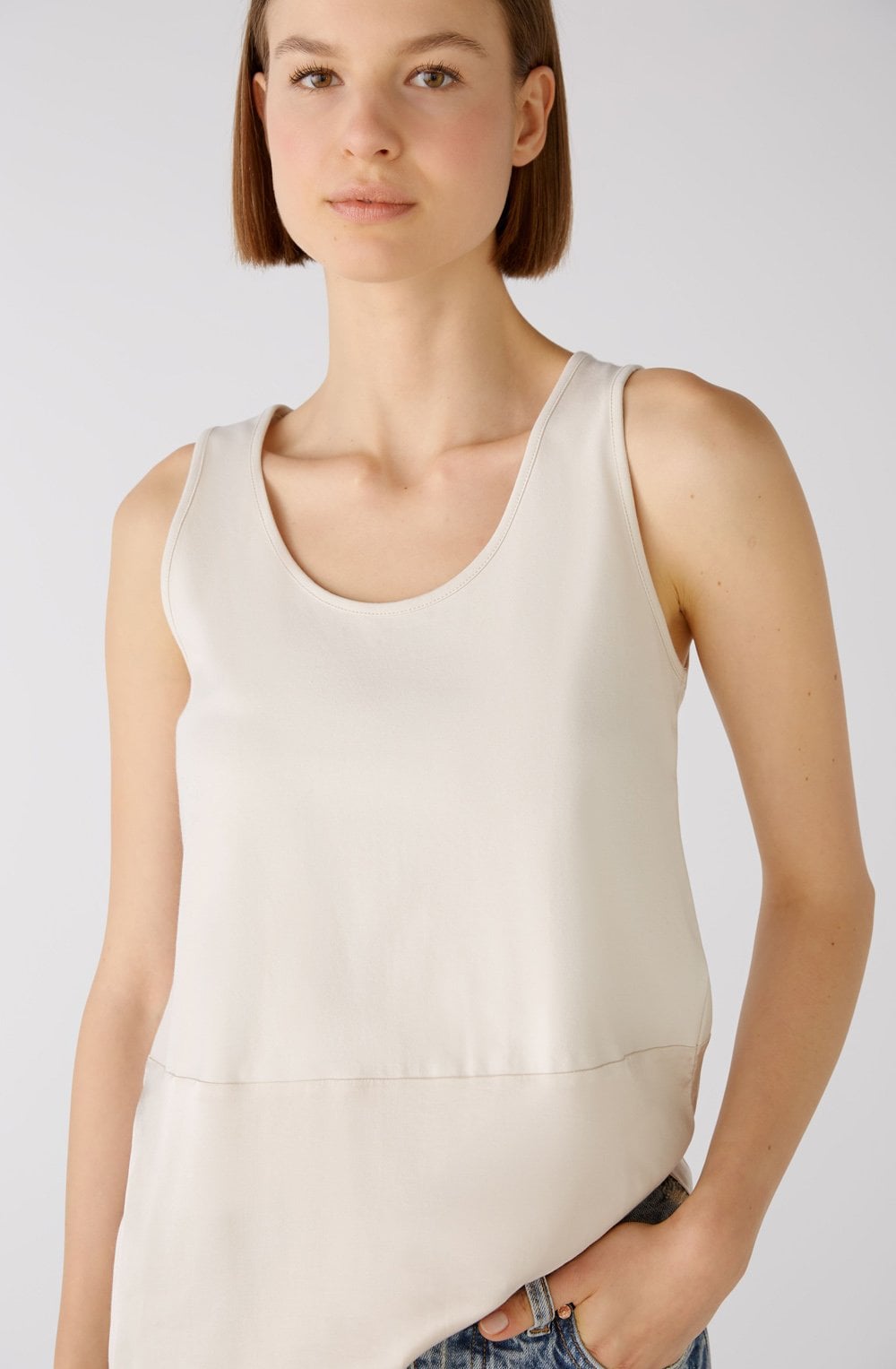 Off White Jersey and Satin Sleeveless Blouse