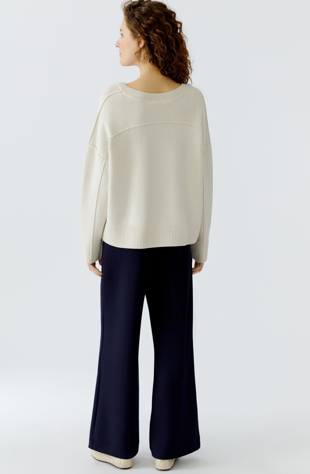 Off White V Neck In Side Out Seam Jumper