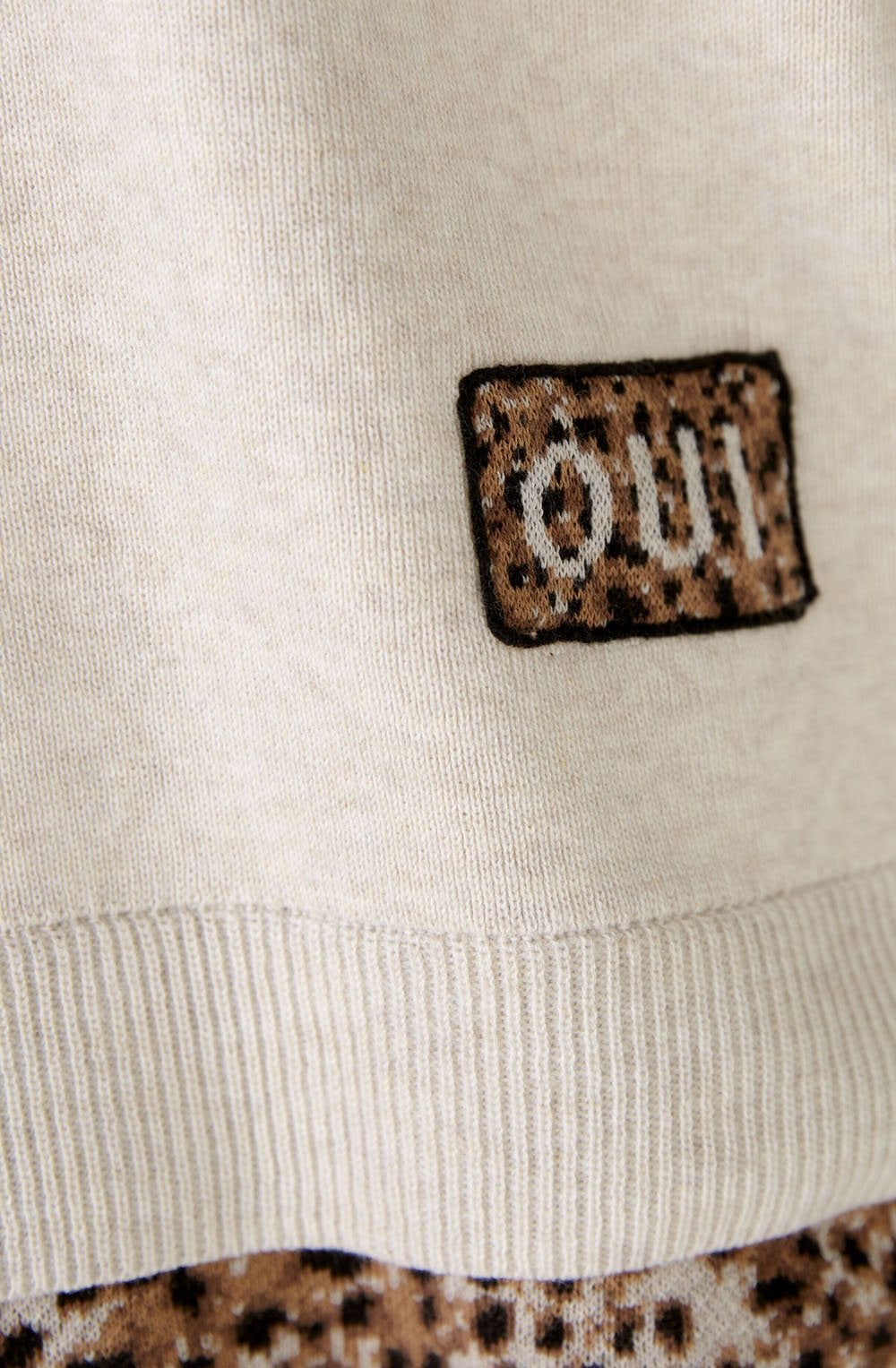 White Camel Jumper with Leo Print Peek